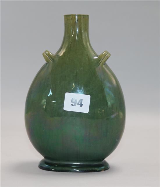 A 19th century Chinese dark green celadon glazed onion shaped vase